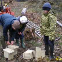 Family wiring the boxes - Photo © Ben Kirby